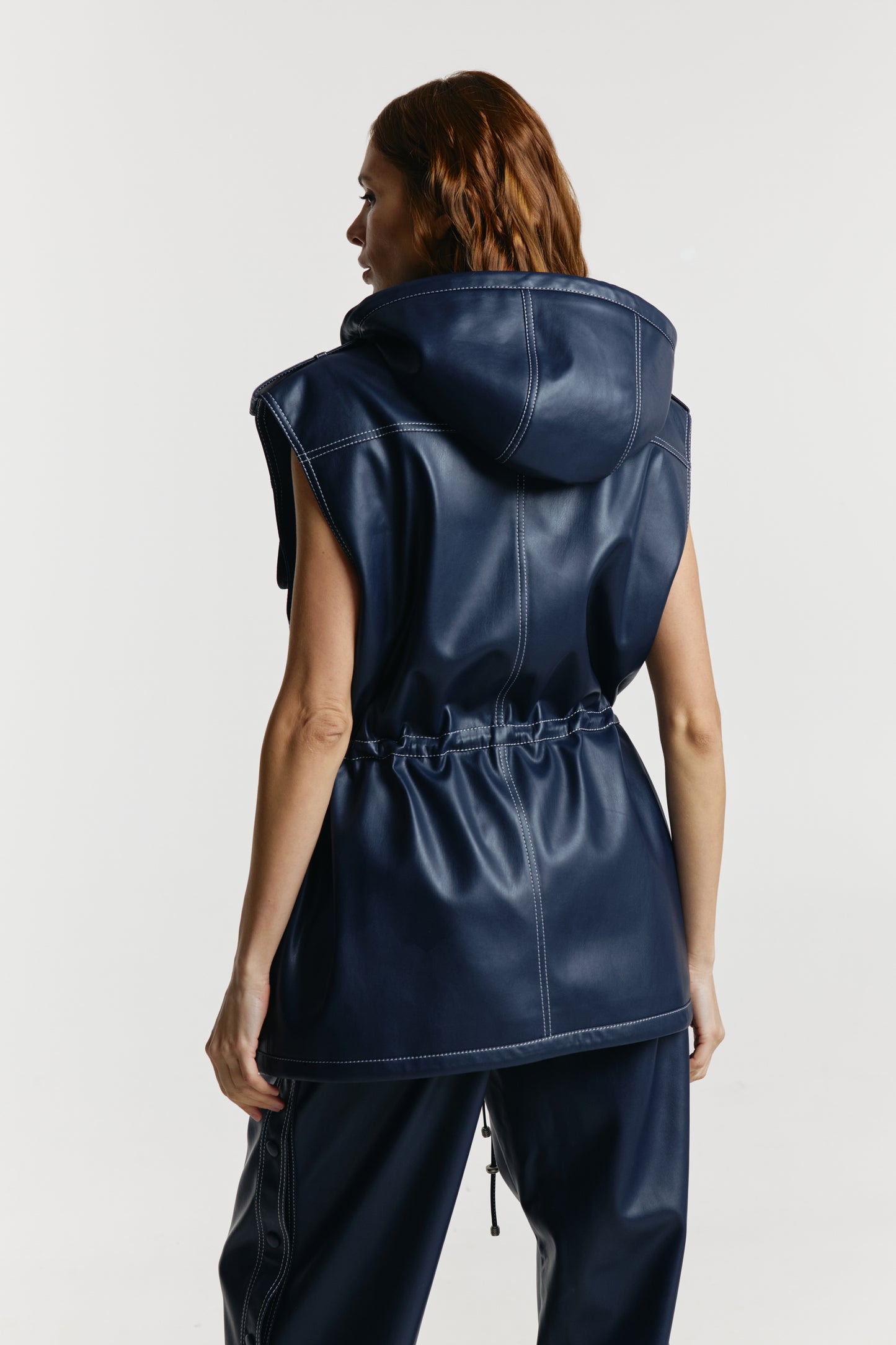 Vest from eco-leather «Betty» with a hood