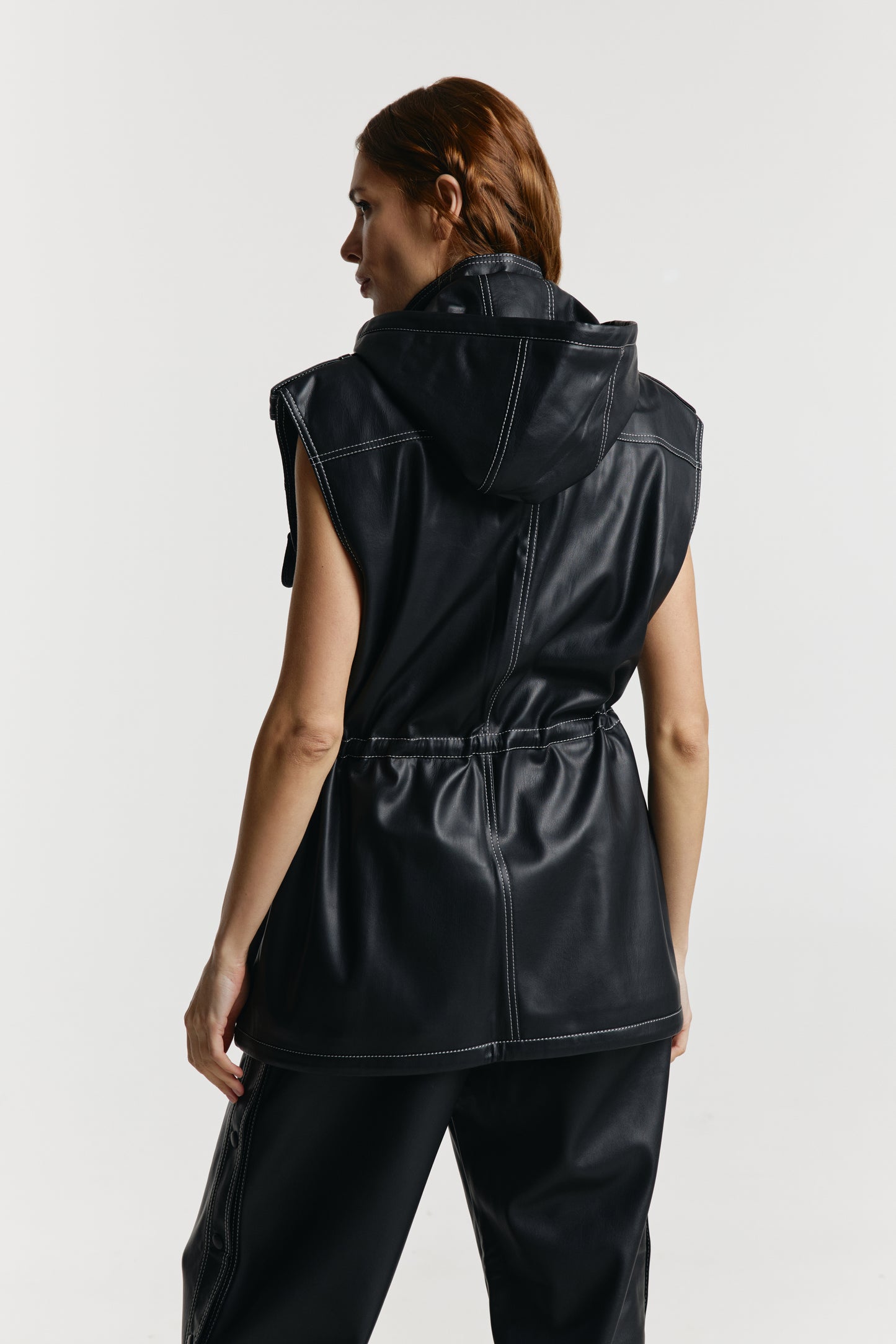 Vest from eco-leather «Betty» with a hood