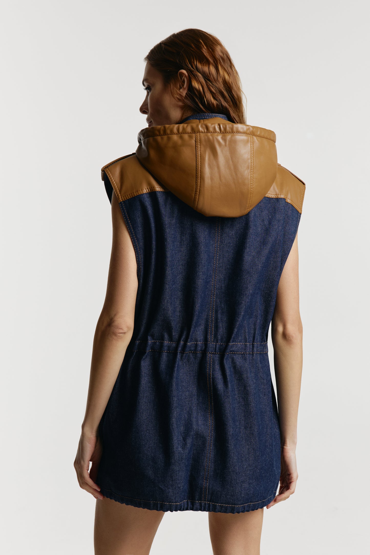 Vest from eco-leather «Betty» with a hood