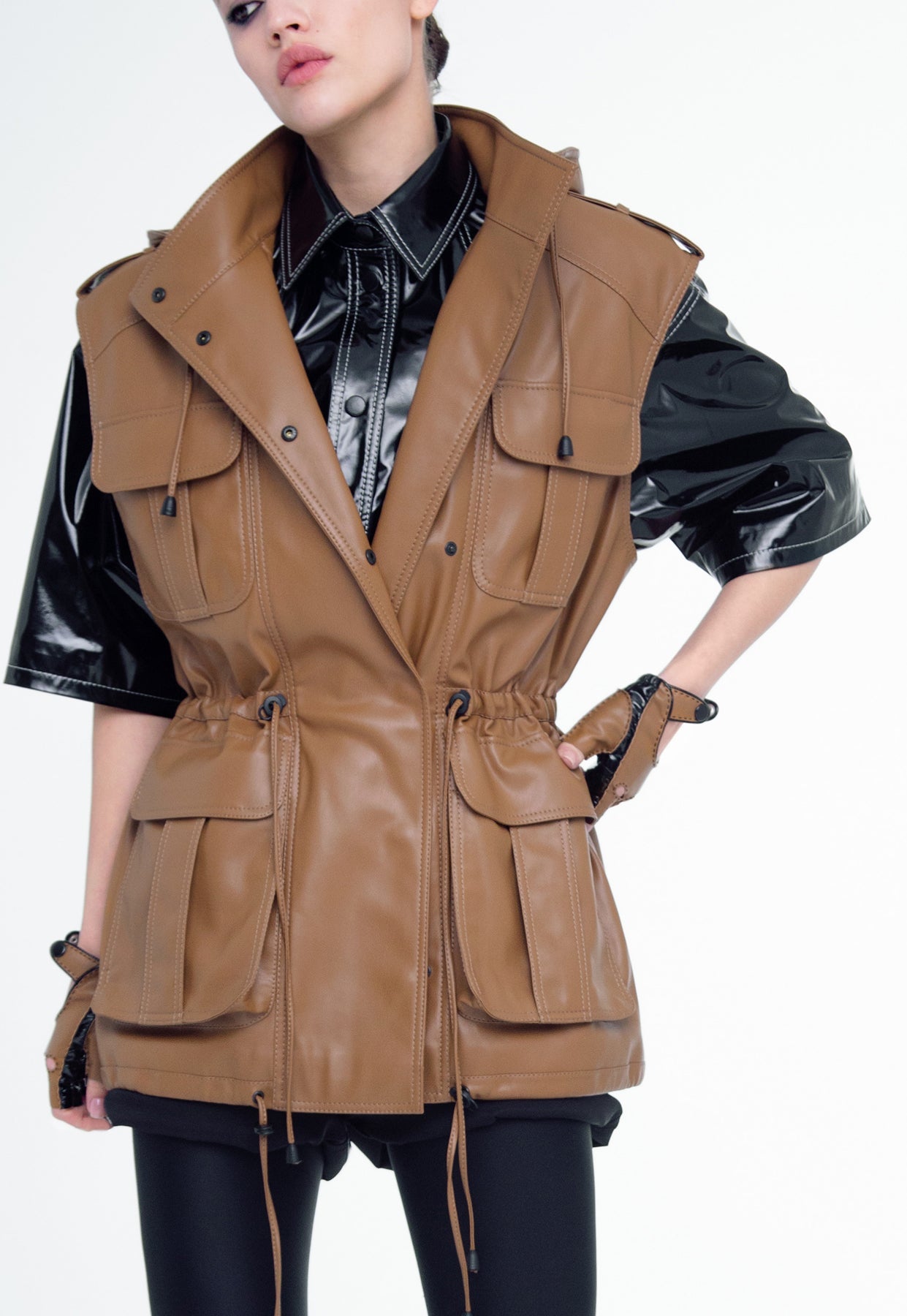 Vest from eco-leather «Betty» with a hood